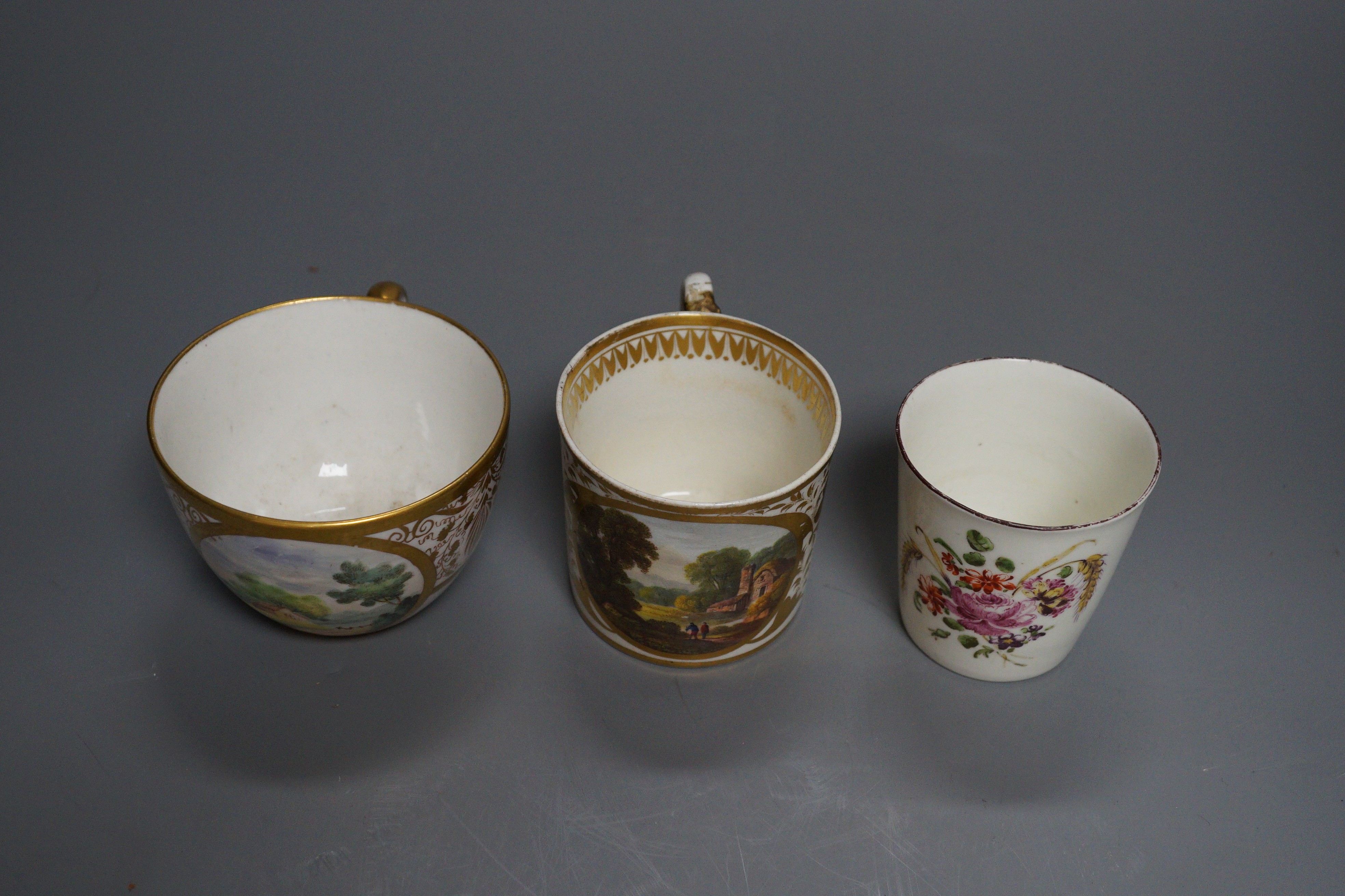 An 18th century miniature porcelain tumbler, probably Derby, a Derby coffee can and a Bute-shape coffee cup